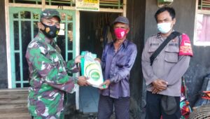 Babinsa Dan Binamas Desa Gunungkaler Salurkan Bantuan Sembako Dari Pemerintah