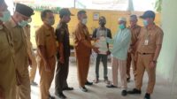 Telah Direalisasikan Bantuan Beras Bulog Desa Pasir Ampo Kepada Masyarakat Penerima BST 