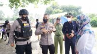 Pilkades serentak Kabid Humas Polda Banten Tinjau TPS 5 dan 6 di Desa Sentul Balaraja