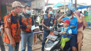 Pemuda Pancasila  PAC Kecamatan Kemiri Gelar Pasar Rakyat Dan Bagikan Masker
