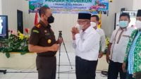 Kesepakatan Bersama Kejari Dengan Dinas PMD Tanggamus Berikan Dampingan Hukum Pekon