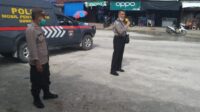 SAT BINMAS POLRES SORONG SELATAN BERIKAN HIMBAUAN VAKSINASI COVID19 DI PASAR KAJASE