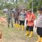 Bupati Aceh Tamiang Dr. Drs. Meurah Budiman, SH, MH, didampingi Sekda, Kalak BPBD, Kabag Prokopim, dan Camat Bendahara bersama unsur Forkopimcam setempat mininjau tanggul jebol di sejumlah titik di Kecamatan Bendahara, Kamis (2/2/2023). Dok : Prokopim 2023]
