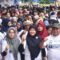 Sekretaris Daerah Kabupaten Aceh Tamiang, Drs. Asra bersama Ketua DWP, Murniati Asra, dan Branch Manager BSI Kualasimpang, Iqbal Pulungan, dan peserta jalan santai HUT Kementerian BUMN ke 25 berpose bersama sesaat sebelum pelepasan, Minggu (19/2/2023), di halaman parkir Kantor Bupati setempat. Dok : Prokopim 2023)