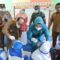 Pj. Bupati Aceh Tamiang, Drs. Meurah Budiman, SH, MH, bersama Ketua TP-PKK Kabupaten, Zuraidah Meurah, Kepala Dinas Kesehatan, dr. Mustakim, M.Kes, Sp.DLP, Ketua DWP, Murniati Asra, Camat dan Forkopimcam Rantau memberikan imunisasi berbentuk tetes manis polio kepada siswa TKN Pembina Rantau.
