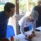 Pj. Bupati Aceh Tamiang Dr. Drs. Meurah Budiman, SH, MH, menandatangani Berita Acara pemasangan patok batas tanah usai pemasangan patok dalam GEMAPATAS di Kawasan Ekowisata Gunung Pandan, Kampung Selamat, Kecamatan Tenggulun.