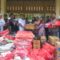 Proses penyerahan bantuan tnggap darurat oleh Dinsos Aceh Tamiang kepada Datok Penghulu Kampung Blang Kandis, Bandar Pusaka.