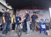 Konsulidasi Partai NasDem Dengan Jalan Sehat Sambil Bagi-Bagi Hadiah Hiburan