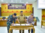 Pj Bupati Asra Teken NPHD Pemilukada 2024
