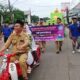 Kepal Desa Pasir Nangka Sahroni bersama istri mengendarai kendaraan Jadul saat meringankan MTQ ke XIV Tingkat Kecamatan Tigaraksa ( foto: Dedi )
