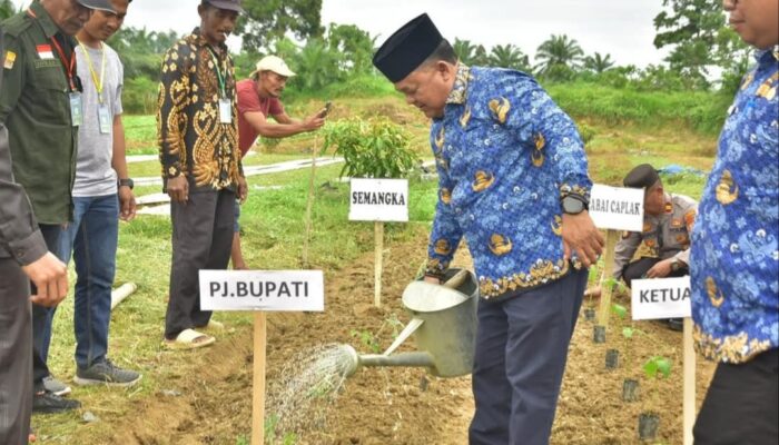 Pj Bupati Asra Hadiri Launching Penanaman Perdana Gugus Polri