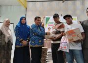 Pj Bupati Aceh Tamiang Serahkan Bantuan Bencana Darurat Baitul Mal Aceh