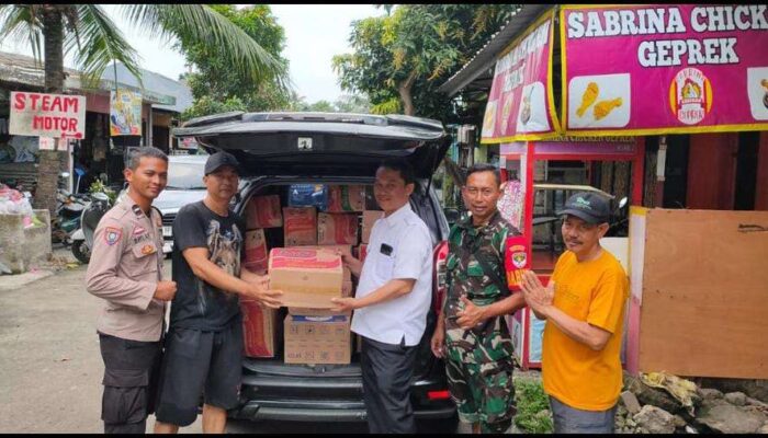 Kades Pasir Nangka Salurkan Bantuan dan Evakuasi Warga Korban Banjir