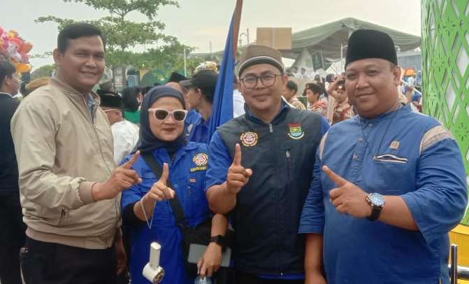 foto: Ketua Karang Taruna Desa Pasir Nangka, Revi Hendriansyah dengan ketua kwri DPC Kabupaten Tangerang terpilih Heriyanto, saat menghadiri MTQ XV kecamatan Tigaraksa